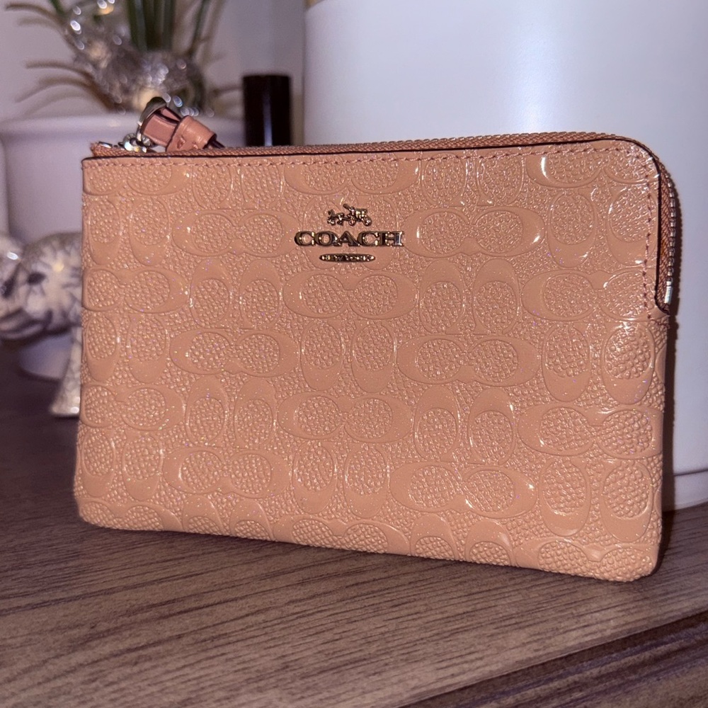 Coach Light blush pink pattern, leather Embossed Wristlet